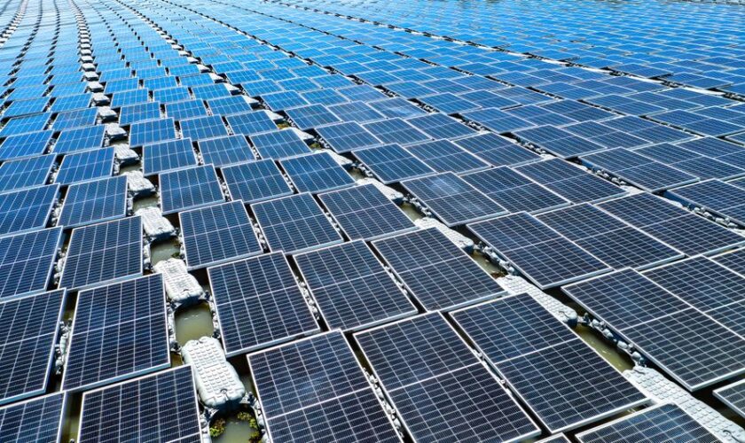 Aerial view of floating solar panels in Pasir Mas, Kelantan, illustrating renewable energy technology.