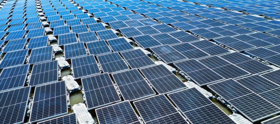 Aerial view of floating solar panels in Pasir Mas, Kelantan, illustrating renewable energy technology.