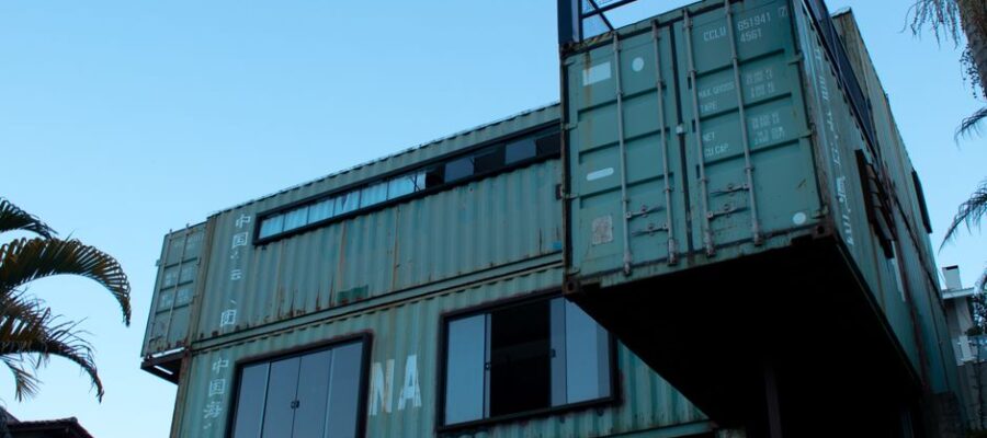 Modern shipping container home in Vila Baependi, Brazil, showcasing creative architecture.