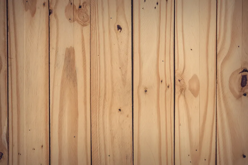 Natural hardwood planks with rustic texture perfect for backgrounds and designs.