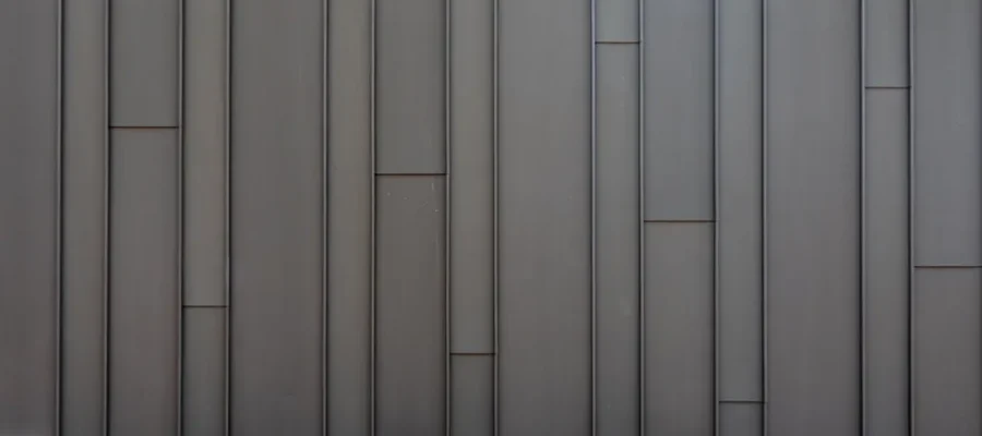 Sleek vertical metal panel wall showcasing a modern minimalist industrial design.
